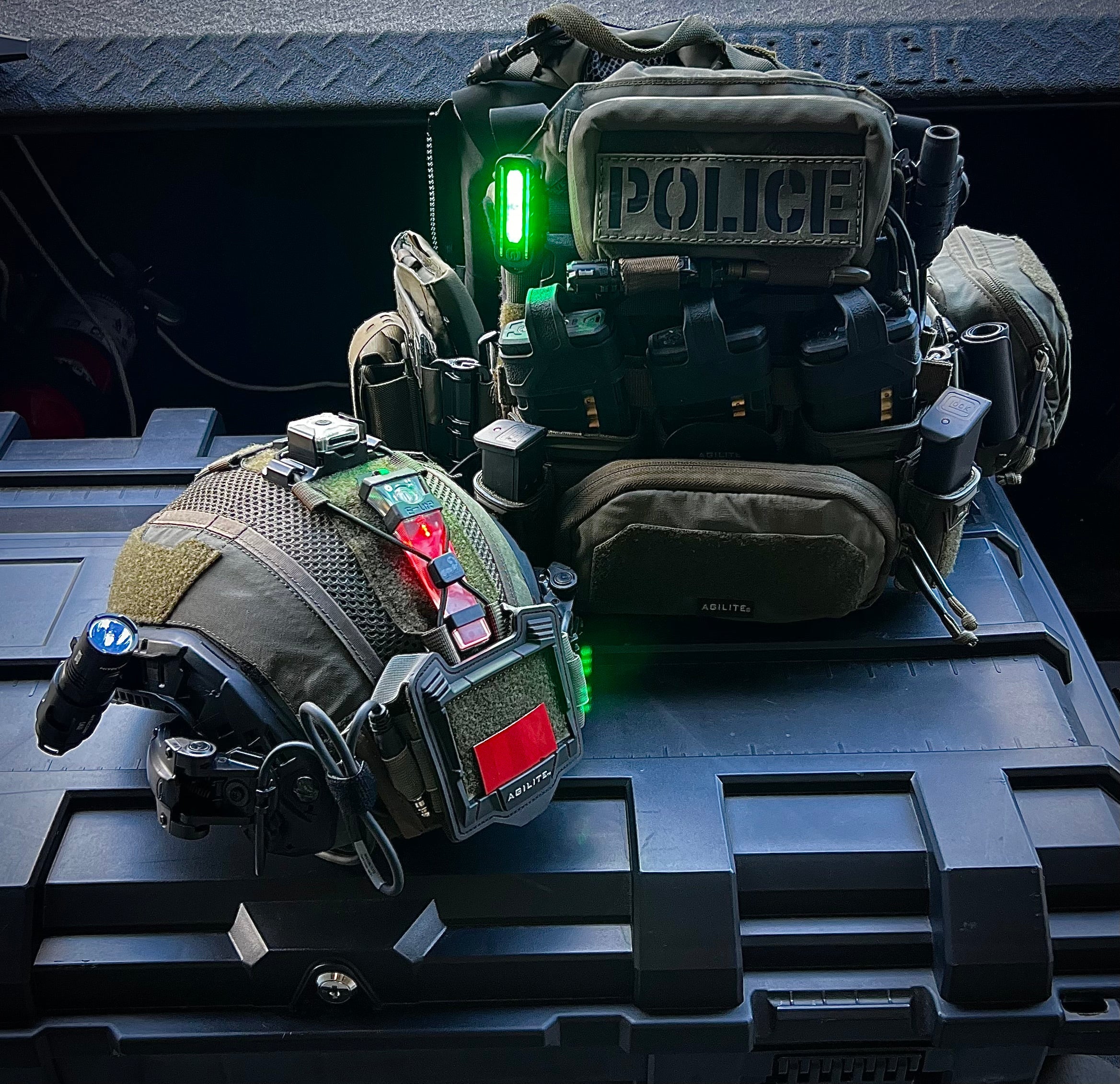 Tactical flashlight on police gear during night patrol, providing bright and reliable illumination. High-intensity, waterproof LED light ideal for law enforcement vehicle inspections and situational awareness. Durable, rechargeable torch suited for rapid intervention, map reading, and emergency response. Essential gear for police and military, ensuring visibility and operational efficiency in low-light environments.