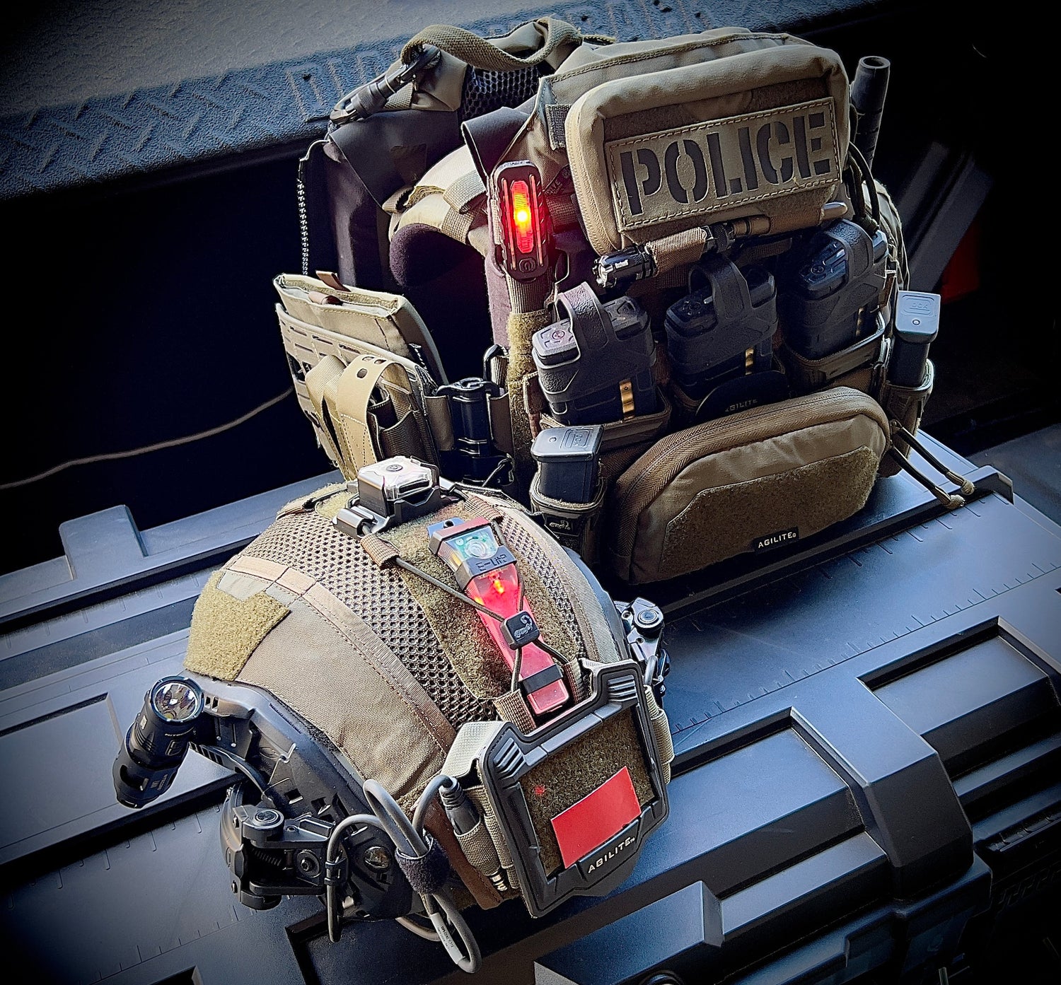 Tactical flashlight on police gear during night patrol, providing bright and reliable illumination. High-intensity, waterproof LED light ideal for law enforcement vehicle inspections and situational awareness. Durable, rechargeable torch suited for rapid intervention, map reading, and emergency response. Essential gear for police and military, ensuring visibility and operational efficiency in low-light environments.